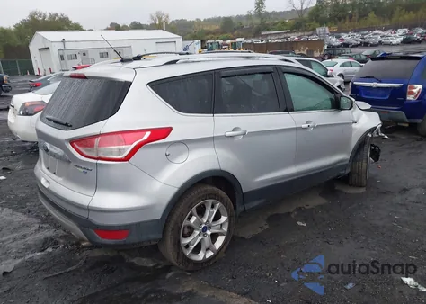 2016 Ford Escape Titanium z USA, uszkodzony, nr VIN 1FMCU9J92GUC33797